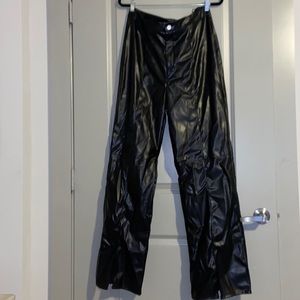 Size 14 . Black pleather pants with slits at ankles.